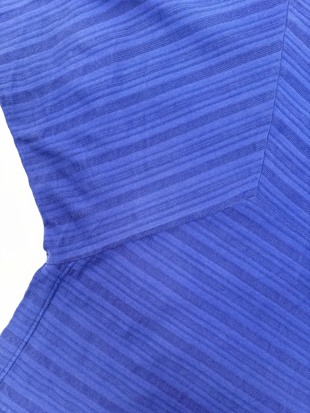 Issey Miyake 80s blue asymmetrical knit top — JAMES VELORIA
